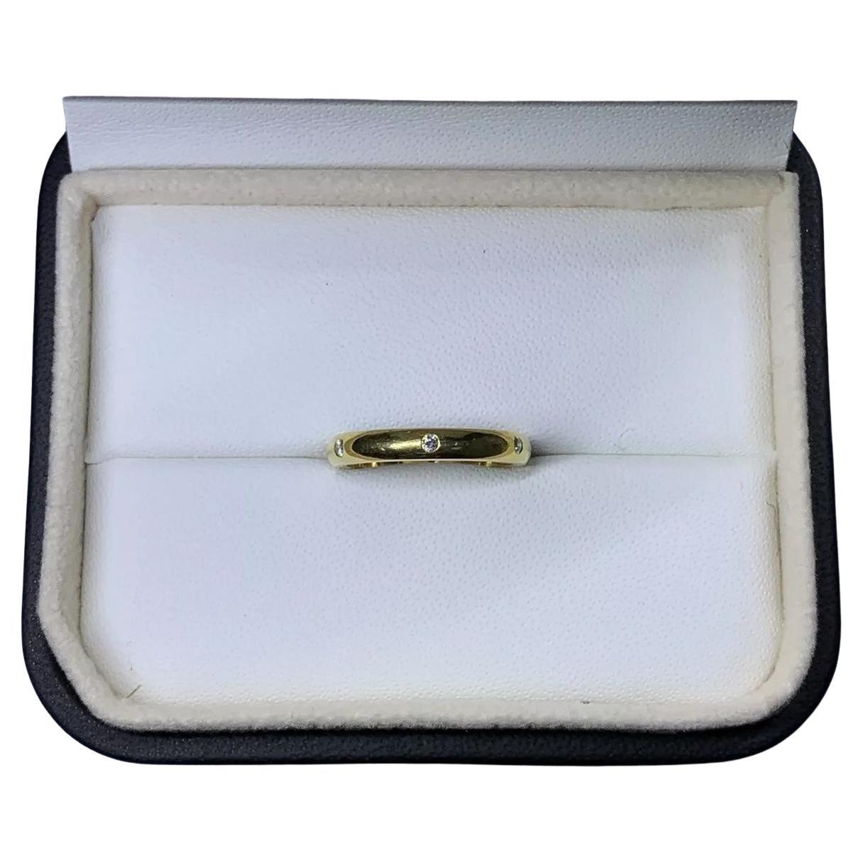 0.50ct Alianza solitaria diamante redondo oro amarillo 18ct