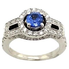 0.50ct Sapphire & Diamond Halo Ring in 18ct White Gold