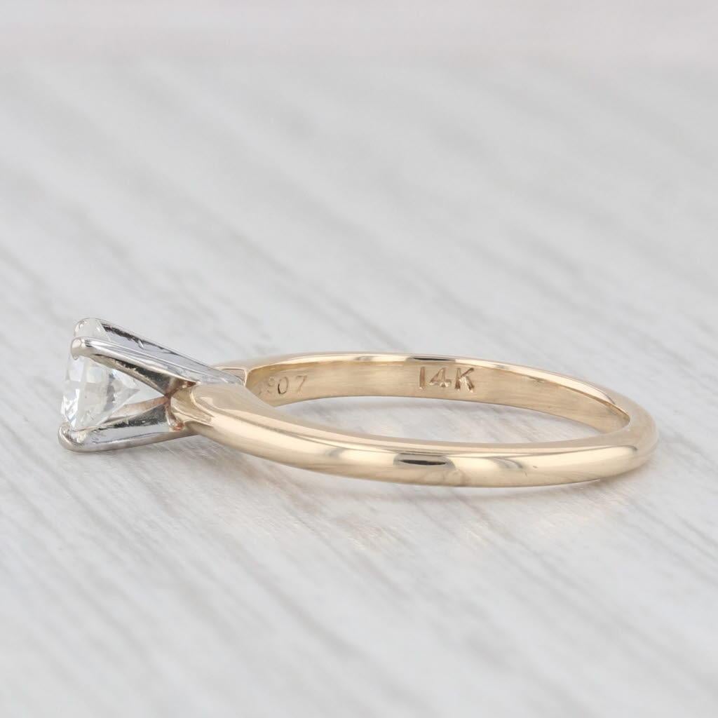 Gemstone Information:
- Natural Diamond -
Carats - 0.49ct 
Cut - Round Brilliant
Color - H- I
Clarity - VS2

Metal: 14k White & Yellow Gold
Weight: 2.2 Grams 
Stamps: 14k
Face Height: 5.1 mm 
Rise Above Finger: 7.5 mm
Band / Shank Width: 1.7