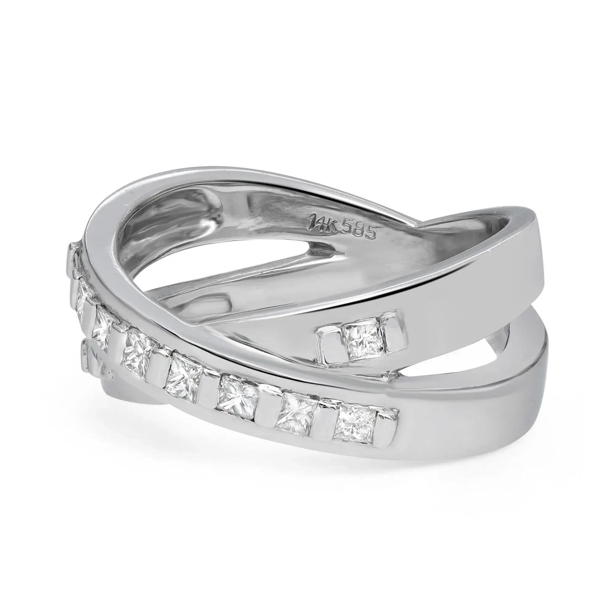 This beautiful crisscross band ring is crafted in 14k white gold and encrusted with 10 princess cut diamonds weighing 0.50 carat. Diamond quality: color I and clarity SI. Ring size: 7.5. Total weight: 7.97 grams. A must-have for your jewelry