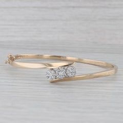 0.50ctw Diamond 3-Stone Bypass Bangle Bracelet 14k Yellow Gold 6.75"