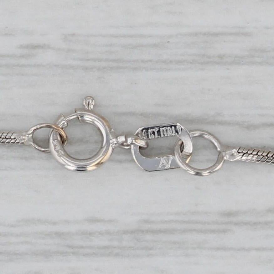 Collana con ciondolo a croce con diamante da 0,50 ct. in oro bianco 14k e catena a serpente da 17