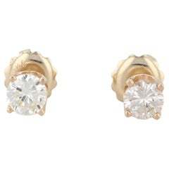 Clous d'oreilles solitaires ronds à vis en or jaune 14 carats avec diamants 0,50 carat