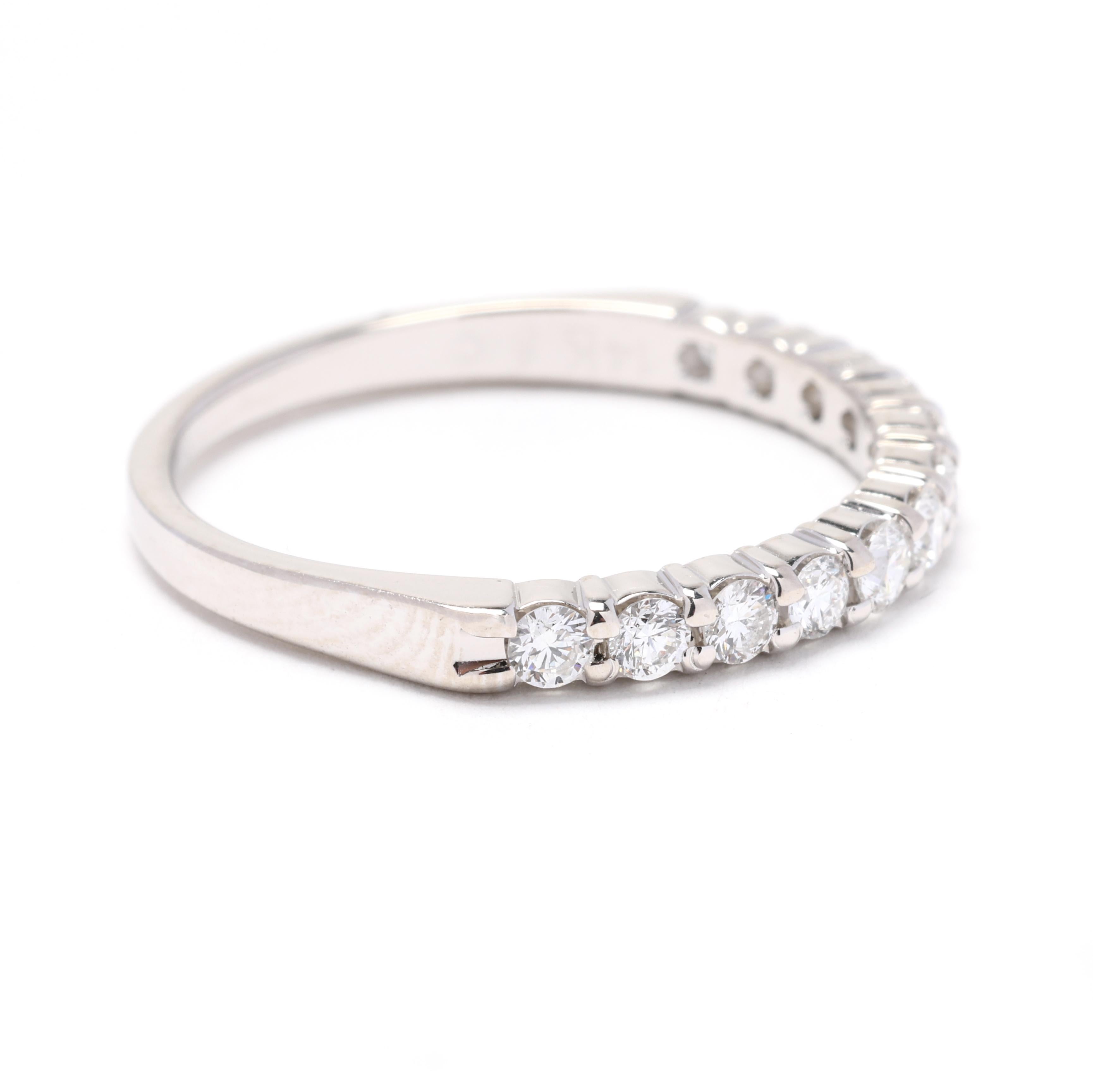 This 0.50ctw diamond wedding band is a beautiful and classic choice for your special day. Set in 14k white gold, this ring features a row of round-cut diamonds that sparkle and shine. The diamonds have a total weight of 0.50 carats and are prong-set