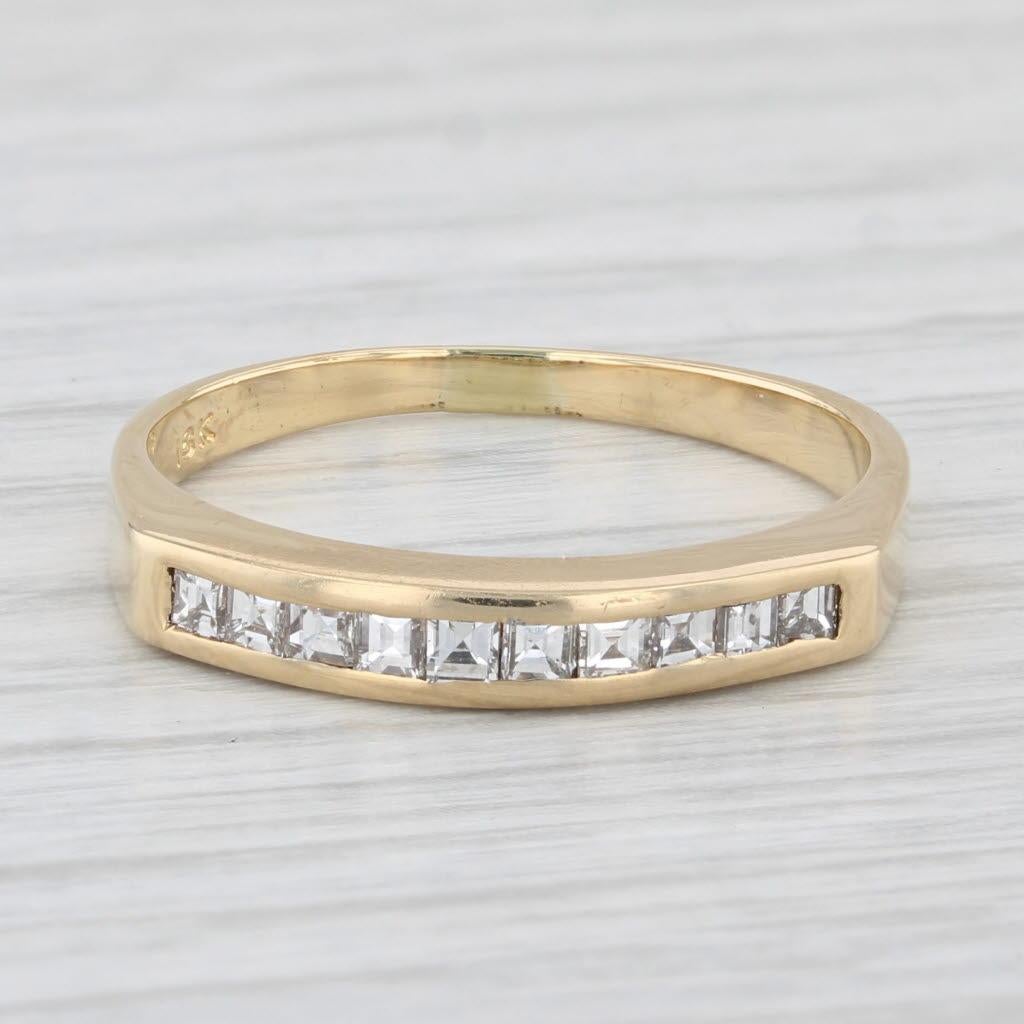Gemstone Information:
- Natural Diamonds -
Total Carats - 0.50ctw
Cut - Step Cut Squares
Color - G - H
Clarity - VS2 - SI1

Metal: 18k Yellow Gold 
Weight: 3.1 Grams 
Stamps: 18k
Face Height: 3.2 mm 
Rise Above Finger: 2.9 mm
Band / Shank Width: 2