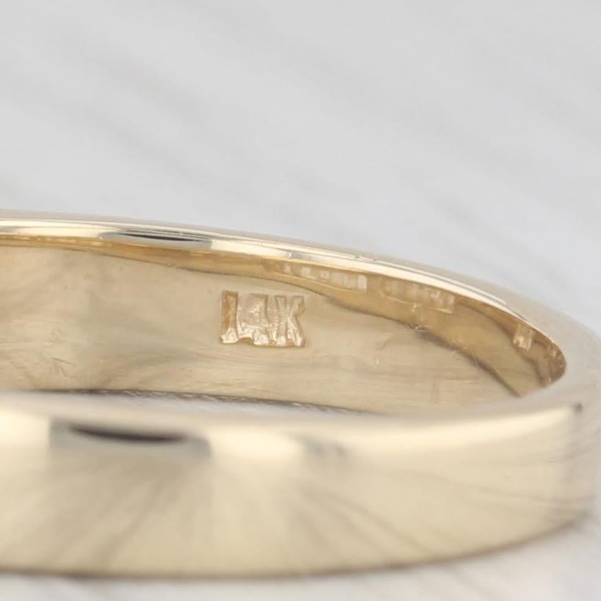 Gemstone Information:
- Natural Diamonds -
Total Carats - 0.50ctw
Cut - Baguette
Color - G - H
Clarity - VS2 - SI1

Metal: 14k Yellow Gold
Weight: 3.8 Grams 
Stamps: 14k
Face Height: 4.1 mm 
Rise Above Finger: 2.8 mm
Band / Shank Width: 3.3 mm

This