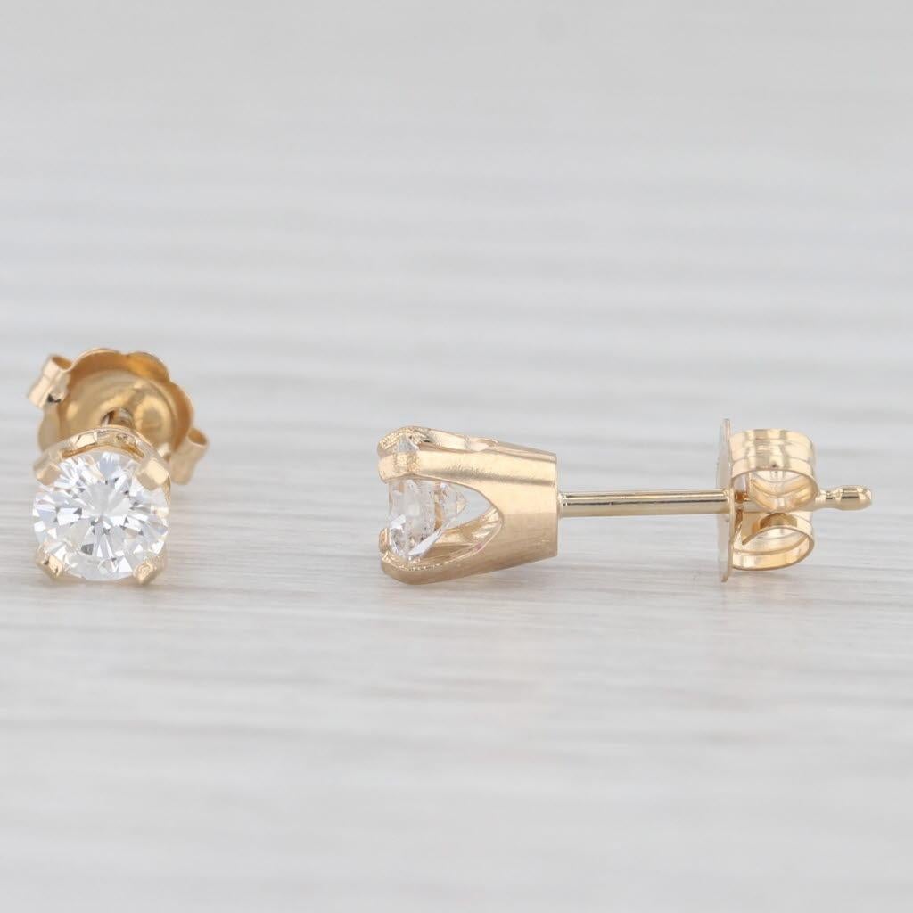 Clous d'oreilles solitaires en or jaune 14 carats avec diamants ronds de 0,50 carat Pour femmes en vente
