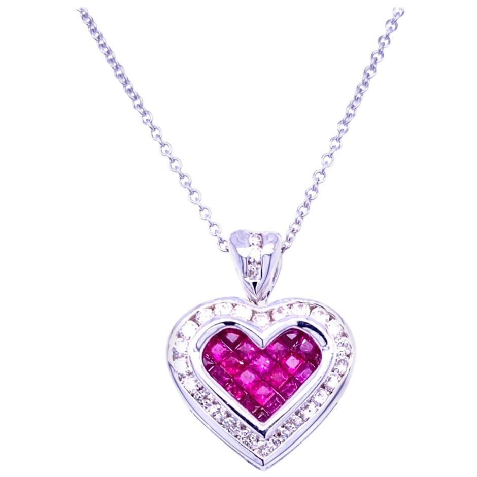 18K Gold Heart shaped Pendant with 21 Invisible Set Princess Cut Rubies (Total Gem Weight 1.05 Ct) surrounded by a Channel set Halo of diamonds with total weight of 0.51 Ct. 
Total Diamond Weight: 0.51 Ct
Total Gem Weight: 1.05 Ct
Total Necklace