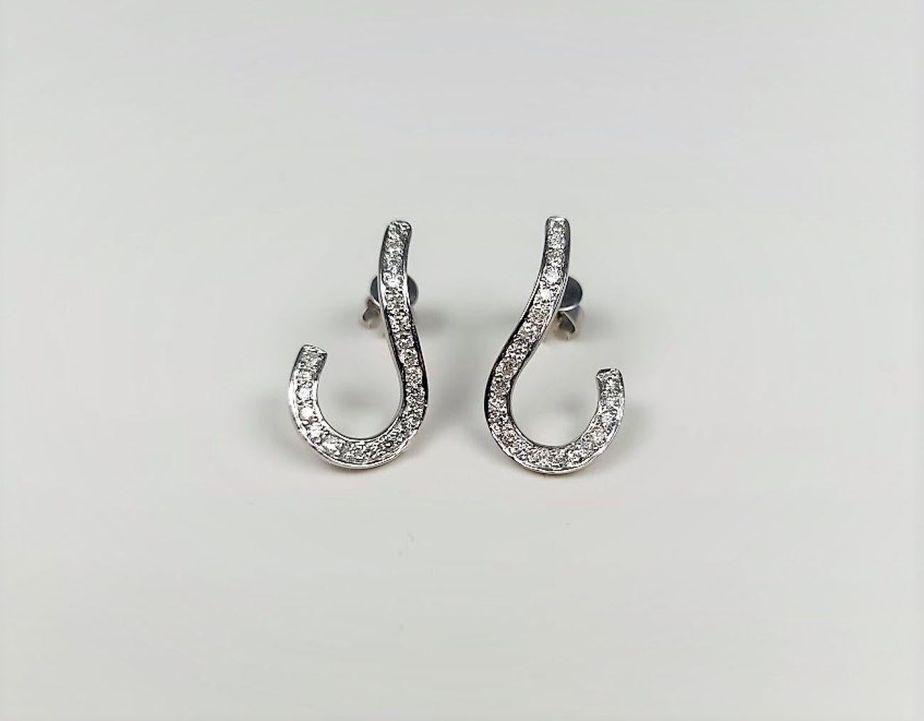 Round Cut 0.51 Carat Diamond 18 Karat White Gold Swirl Earrings For Sale