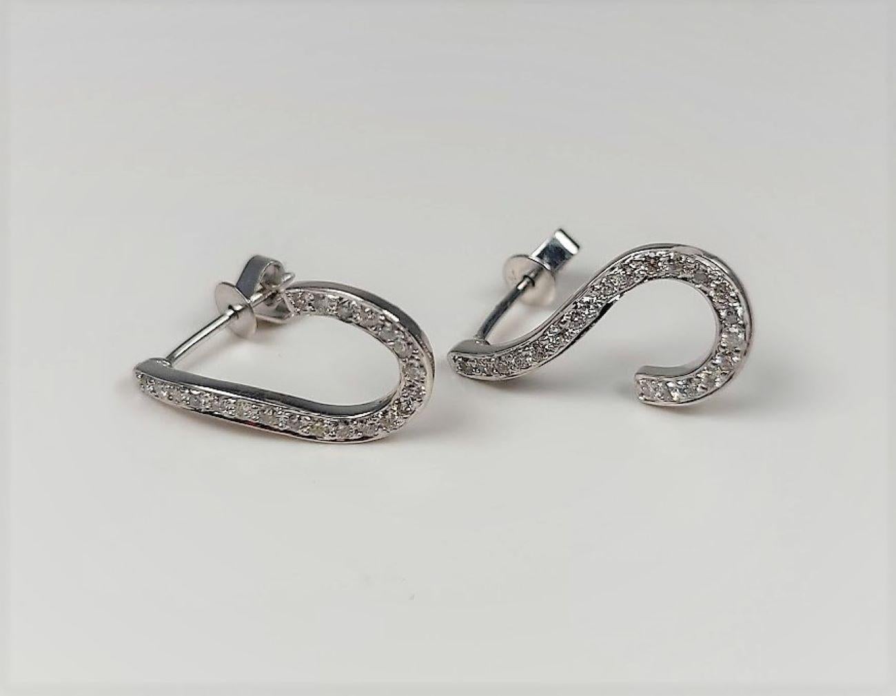 0.51 Carat Diamond 18 Karat White Gold Swirl Earrings For Sale 1