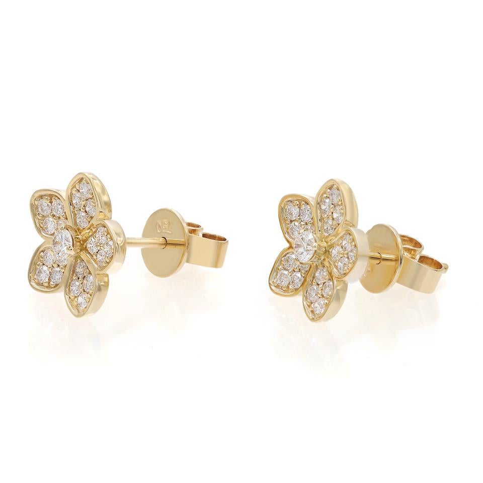 Experience the enchantment of these romantic floral stud earrings, crafted in 18K yellow gold. These earrings are a true celebration of whimsical beauty, adorned with a pavé setting of sparkling diamonds totaling 0.51 carats. The intricate floral