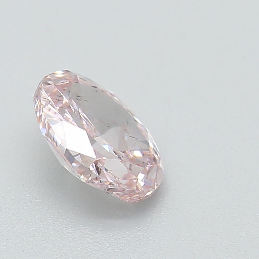 0.51 Carat Fancy Light Pink Oval Cut Diamond SI2 Clarity GIA Certified For Sale 2