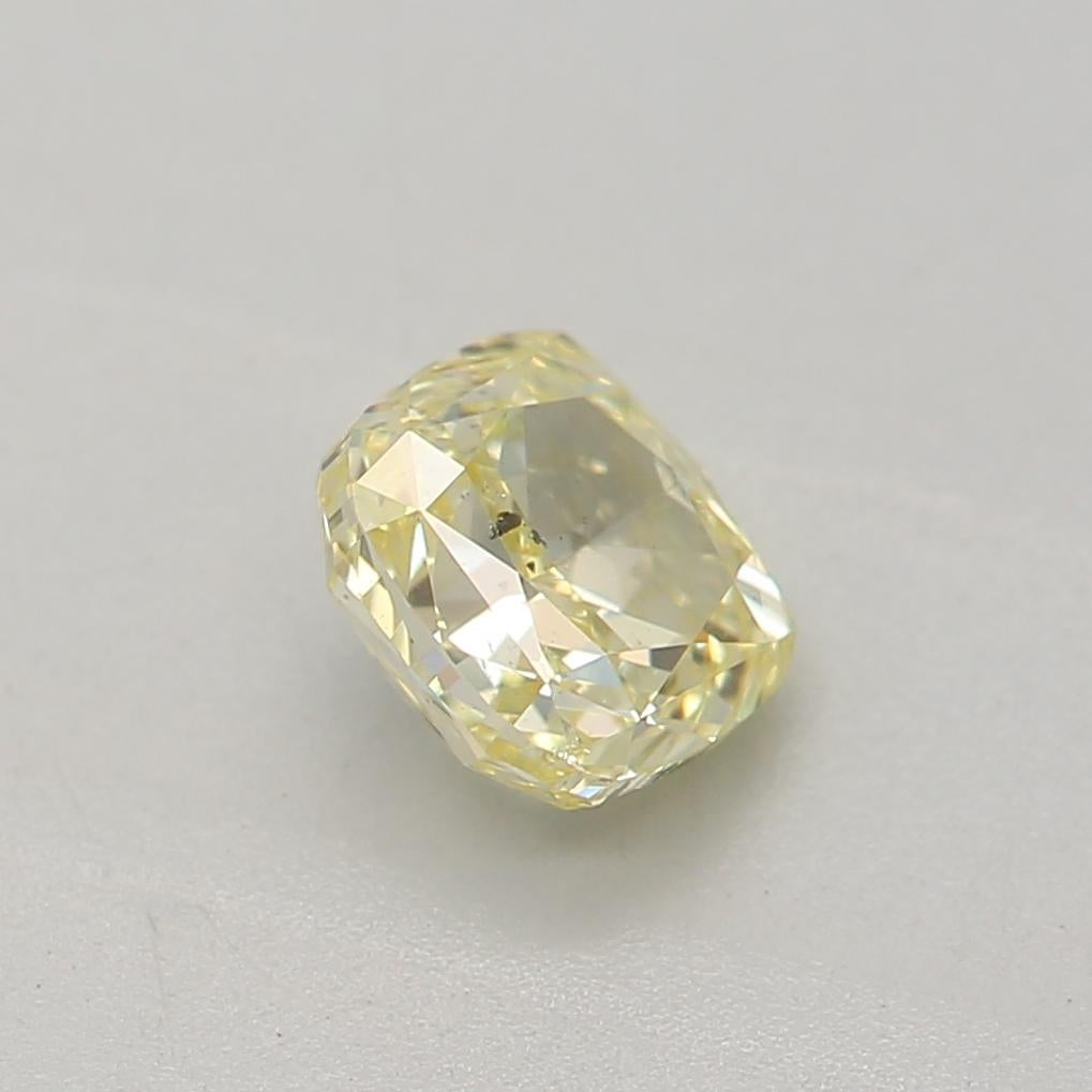 Women's or Men's 0.51 Carat Fancy Yellow Cushion cut diamond SI2 Clarity GIA Certified For Sale