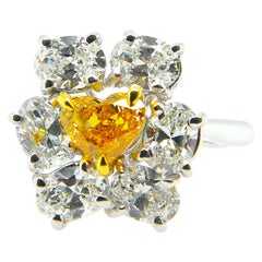 0.51 Carat GIA Certified Fancy Vivid Orange-Yellow Diamond and Diamond Ring