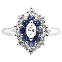 0.51 Carat Natural Marquise-Cut Diamond and Sapphire Ring Set in Platinum