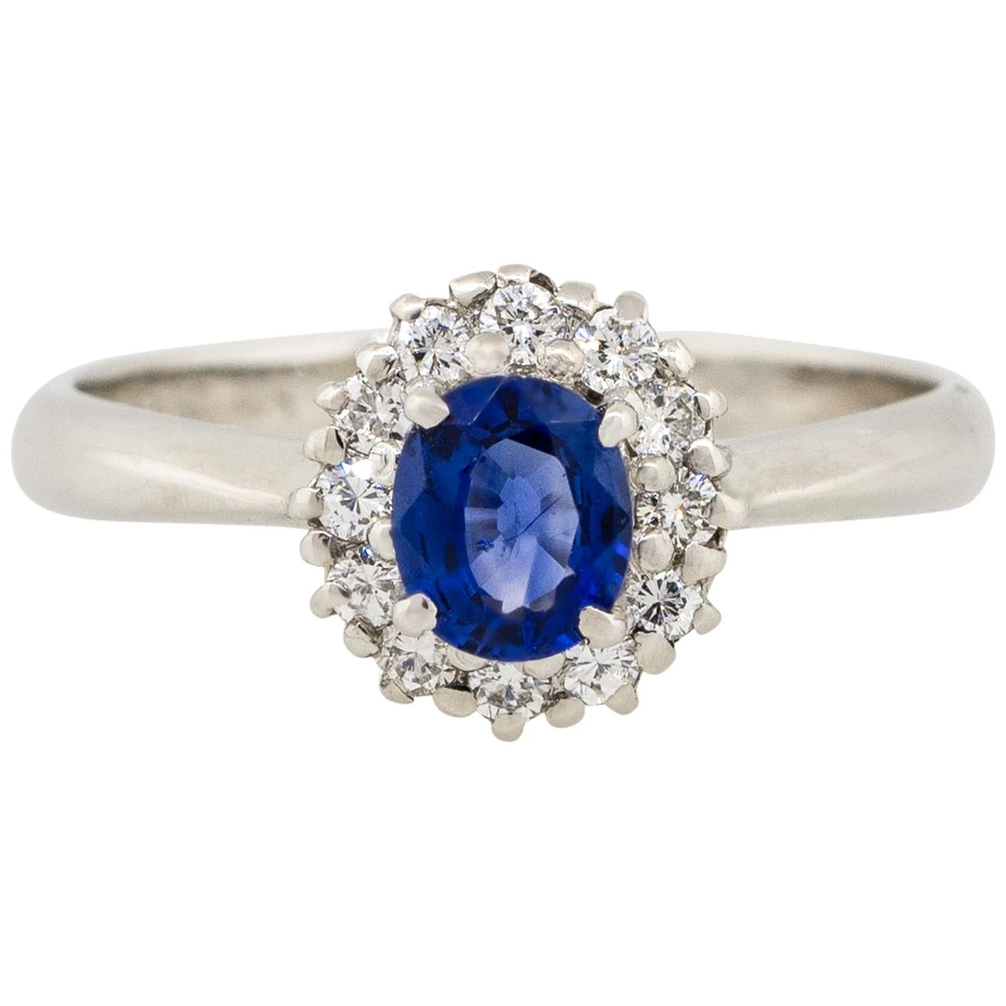 0.51 Carat Oval Sapphire Center Diamond Halo Ring Platinum in Stock