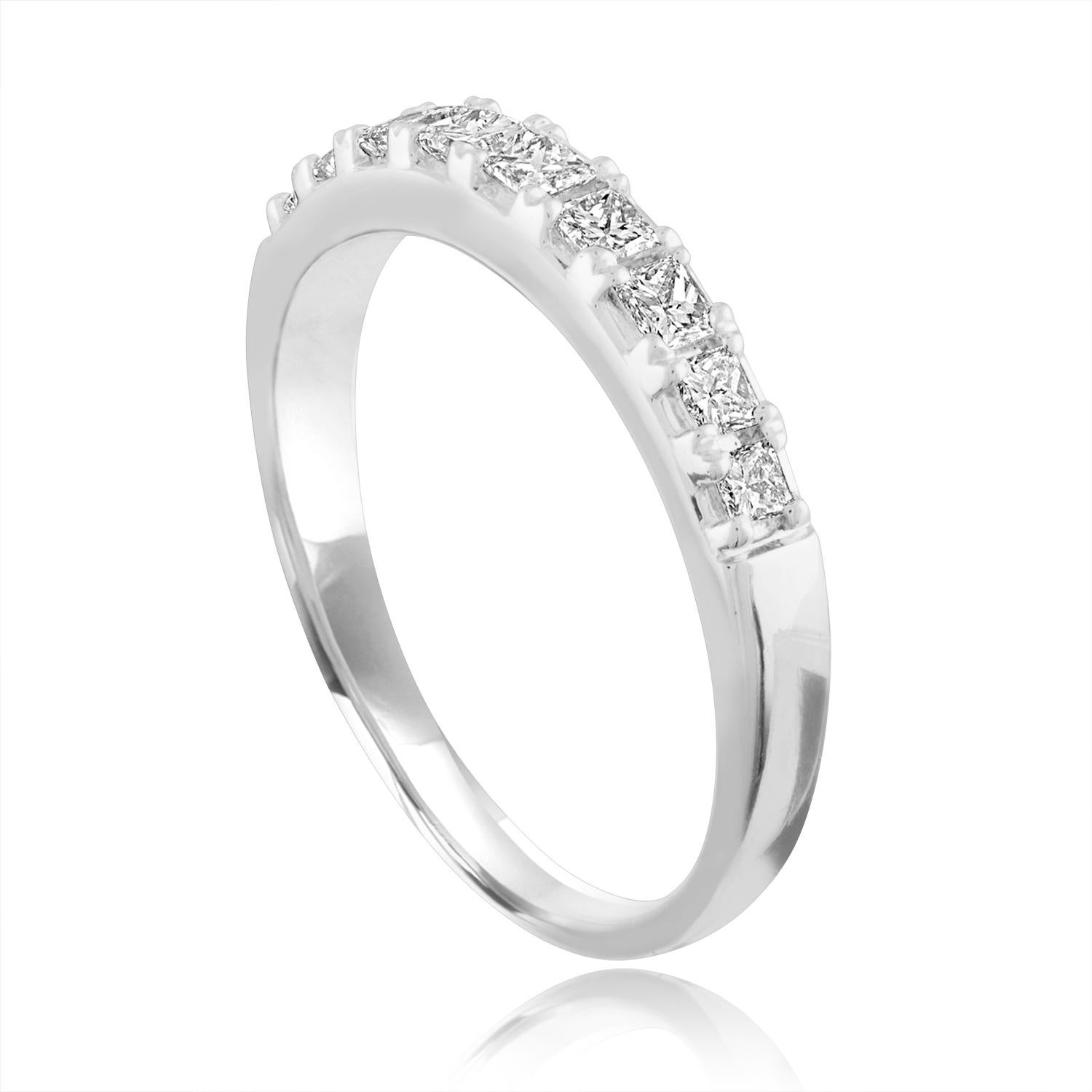 Very Classic Wedding Band
The Nine Stone Band is 18K White Gold
There are 0.51 Carats In Diamonds F/G VS/SI
The ring is a size 6.75, sizable.
The ring weighs 3.2 grams