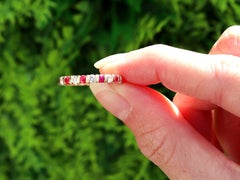 0.51 Carat Ruby and 0.39 Carat Diamond 18k Yellow Gold Eternity Ring Circa 1980