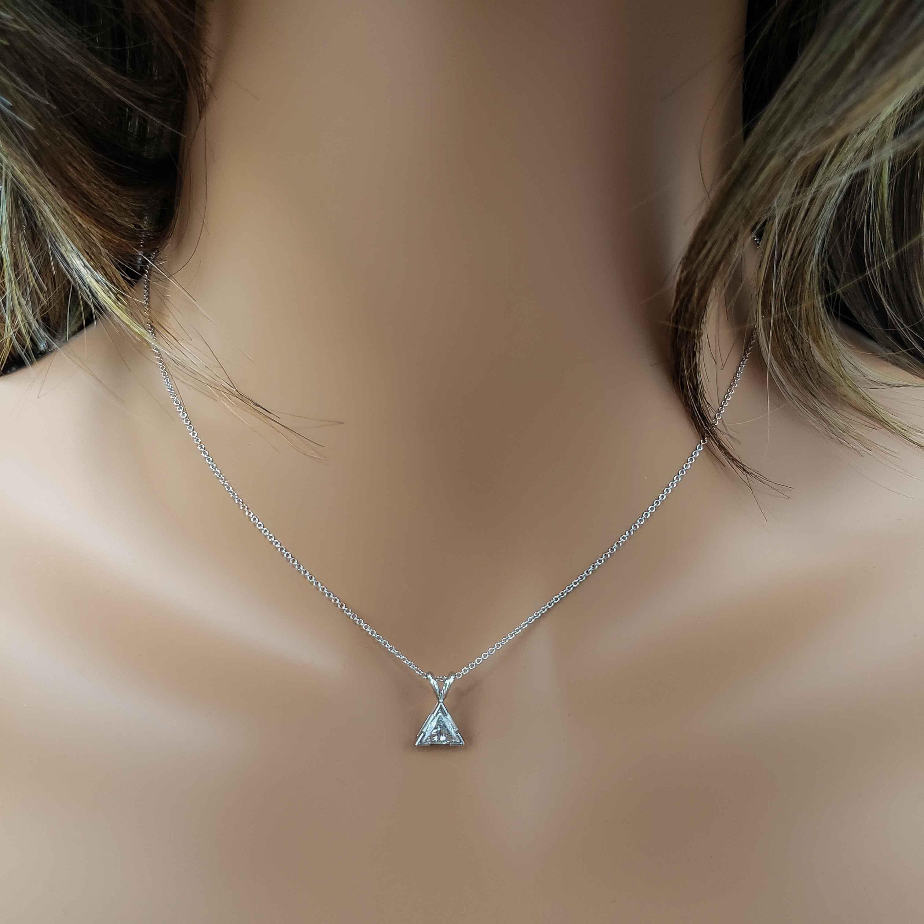 A fashionable yet simple pendant necklace showcasing a single 0.51 carat trillion diamond, set in a 14K White Gold mounting. Suspended on a 16 inches white gold chain. Perfect for your everyday use. 

Roman Malakov is a custom house, specializing in