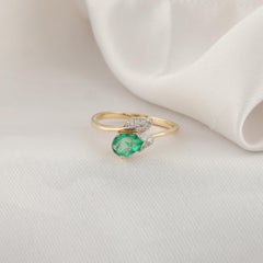 0.51 Carat Zambian Emerald 0.11 Carat SI/H Diamond Ring 14 Karat Yellow Gold
