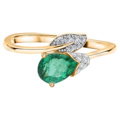 0.51 Carat Zambian Emerald 0.11 Carat SI/H Diamond Ring 14 Karat Yellow Gold