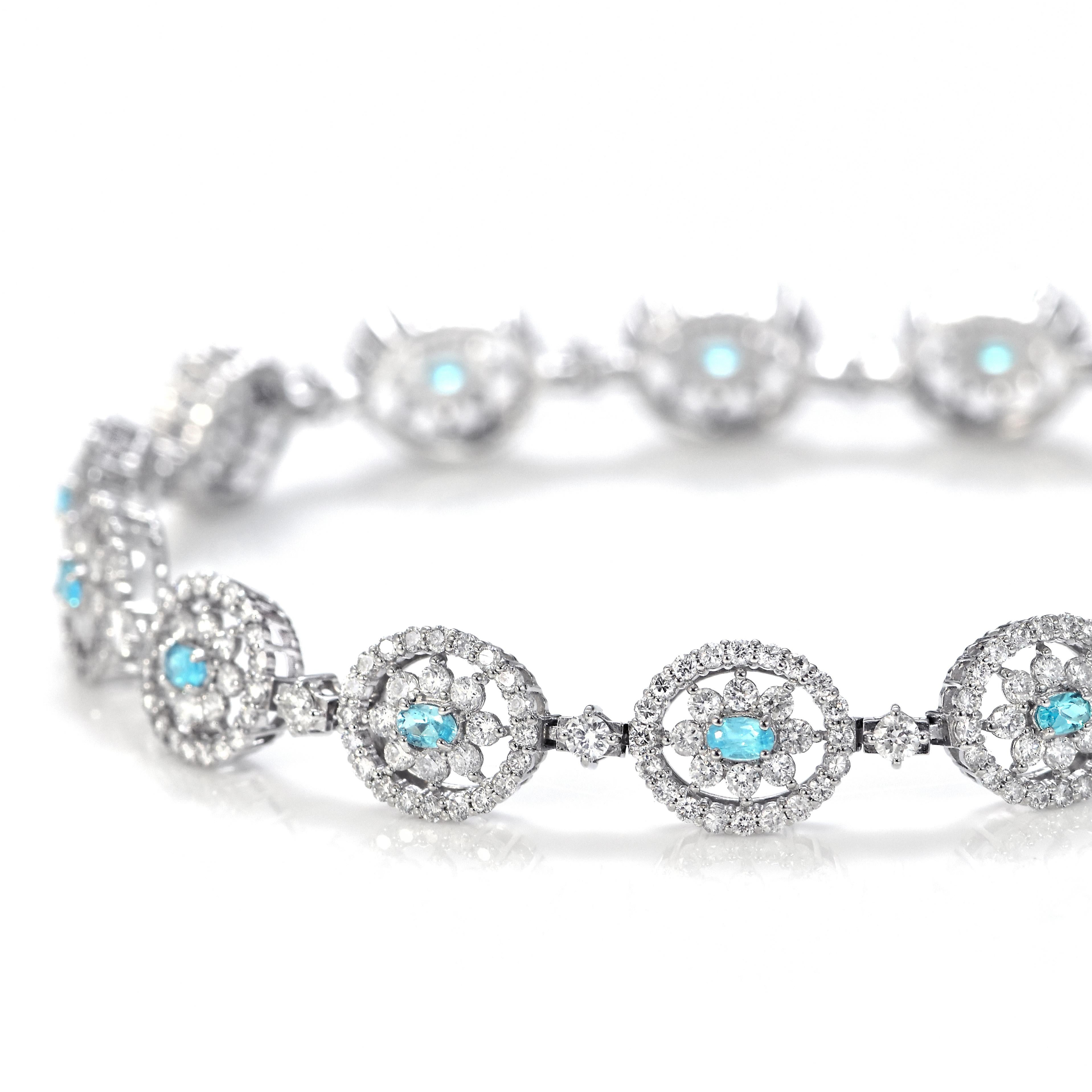 Oval Cut 0.51 Carats Brazilian Paraiba Tourmaline and Diamond Bracelet Made in Platinum