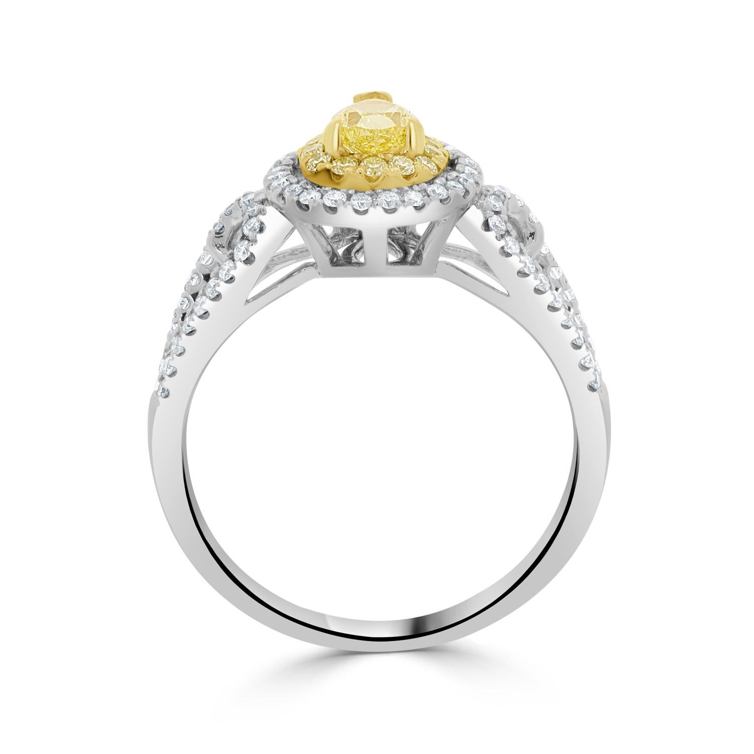 World-class artfulness and modern design come together in this ring. This ring is finely crafted of 14K two-tone gold and set with yellow Diamonds for a luxury finish. Surrounded by white Diamonds, the ring adds mesmerizing sparkle to your look.
