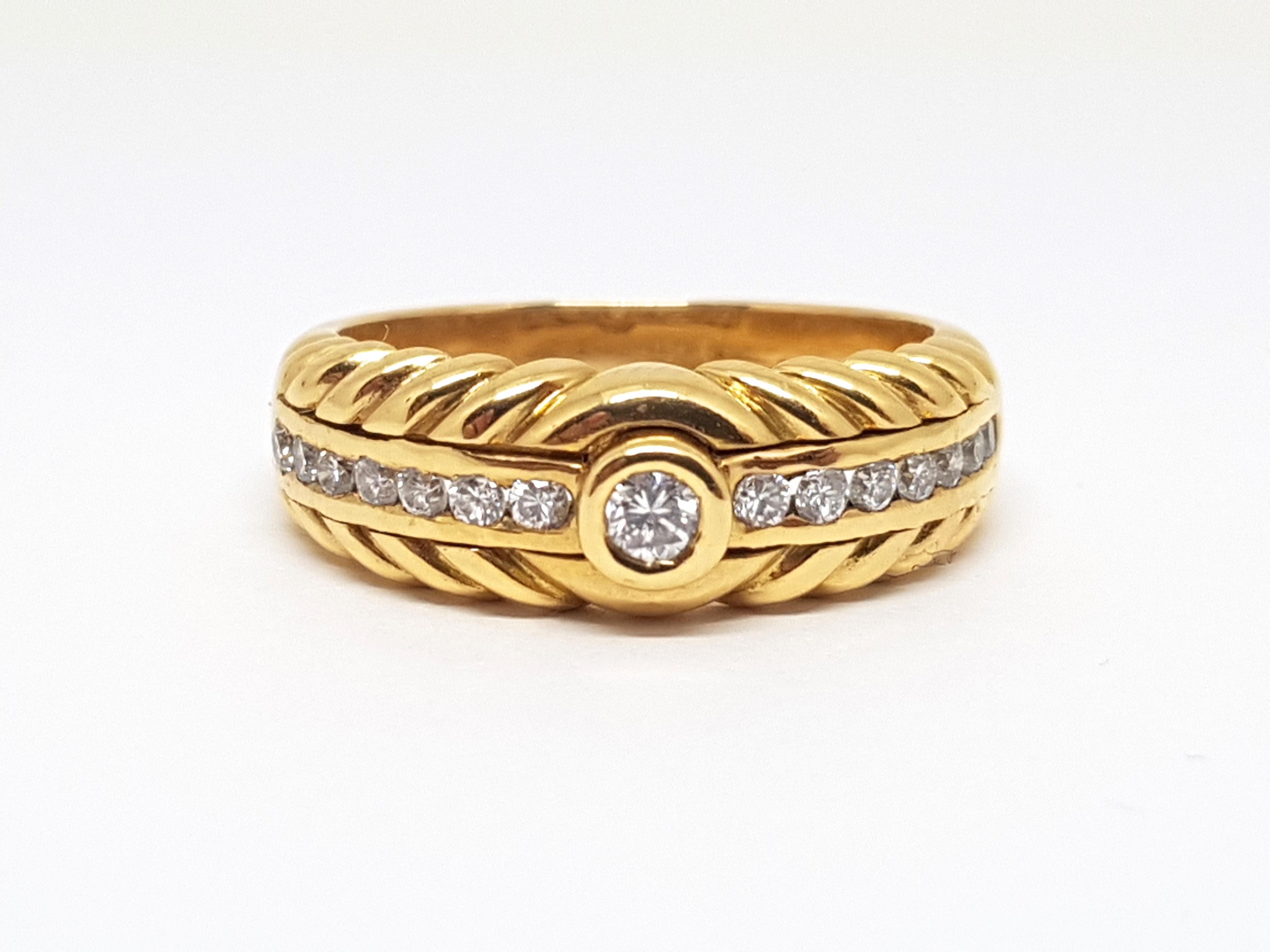 Gold: 18 carat yellow gold 
Weight: 7,61gr. 
Diamonds: 0,52 ct. colour: F clarity: VS 
Width: 0,7 cm. 
Ring size: free adjustment of ring up to size 70 
All our jewellery comes with a certificate and 5 years guarantee 
Shipping: free worldwide