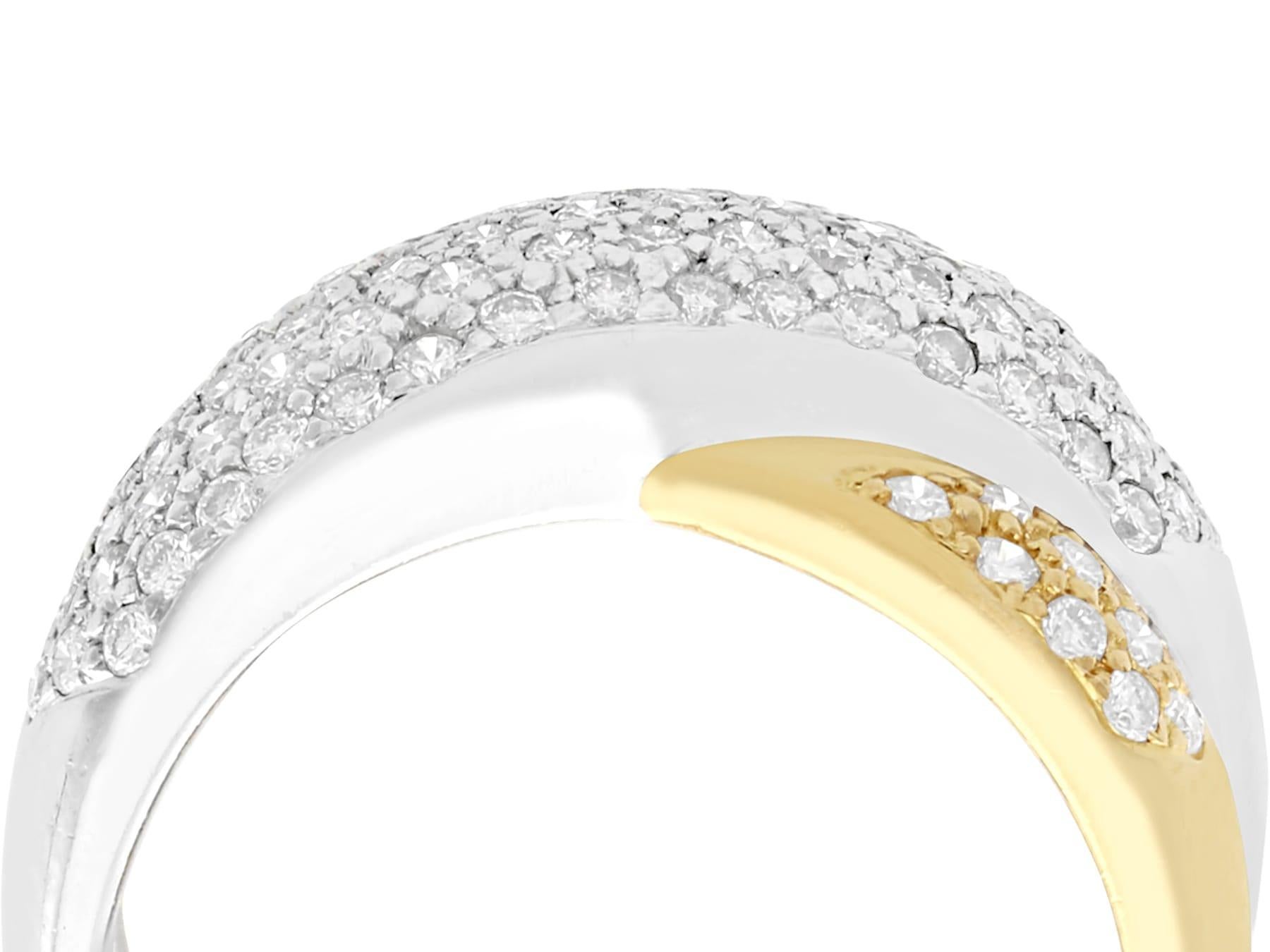  An impressive 0.52 carat diamond, 18 karat yellow gold and 18 karat white gold cocktail ring; part of our diverse diamond jewelry collections.

This fine and impressive diamond ring has been crafted in 18k yellow and white gold.

The ring has a