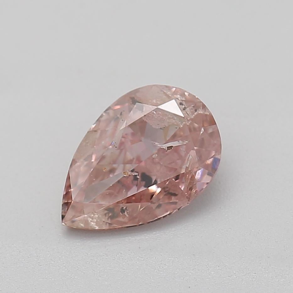 *100% NATURAL FANCY COLOUR DIAMOND*

✪ Diamond Details ✪

➛ Shape: Pear
➛ Colour Grade: Fancy Orangy Pink
➛ Carat: 0.52
➛ Clarity: I2
➛ GIA Certified 

^FEATURES OF THE DIAMOND^

Our fancy orangy pink diamond is a rare and highly sought-after