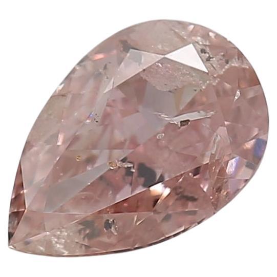 0.52 Carat Fancy Orangy Pink Pear Cut Diamond I2 Clarity GIA Certified For Sale