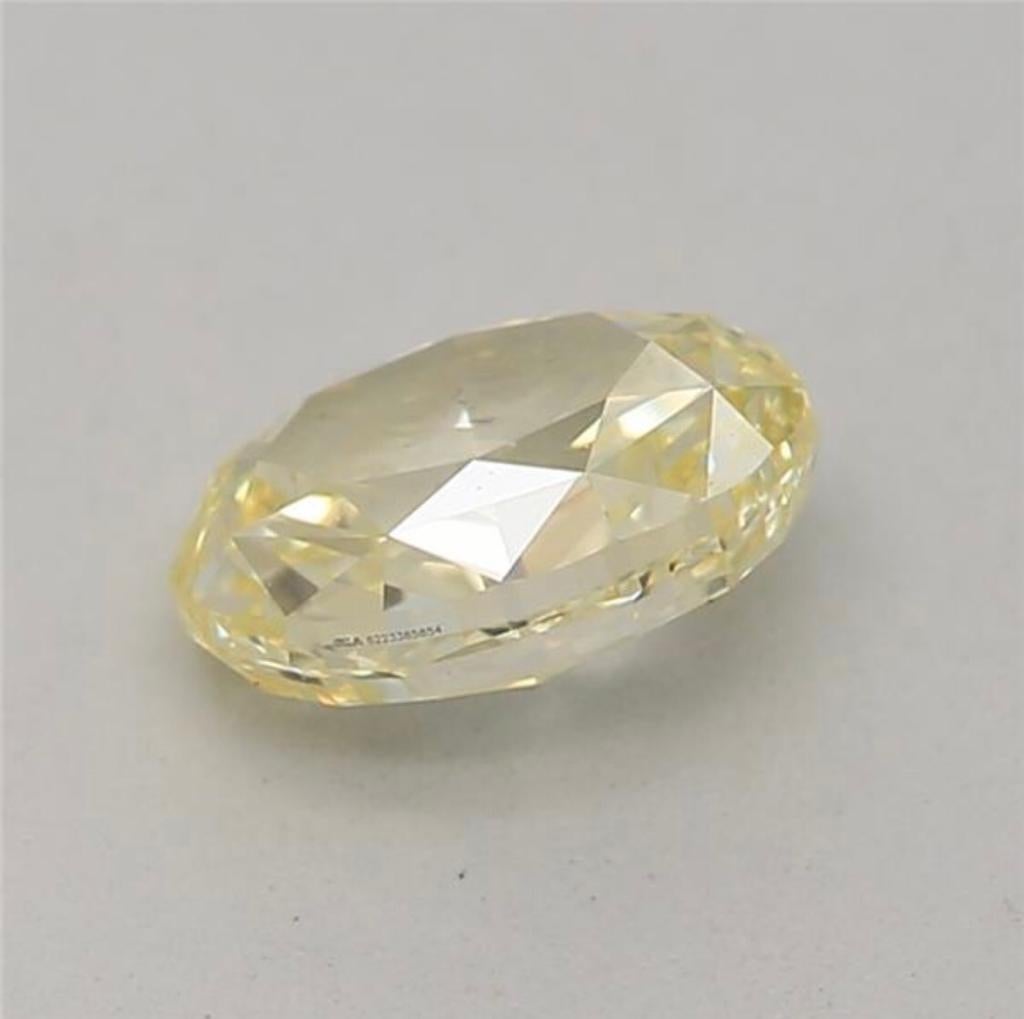 0.52 Carat Fancy Yellow Oval shaped diamond SI1 Clarity GIA Certified For Sale 1