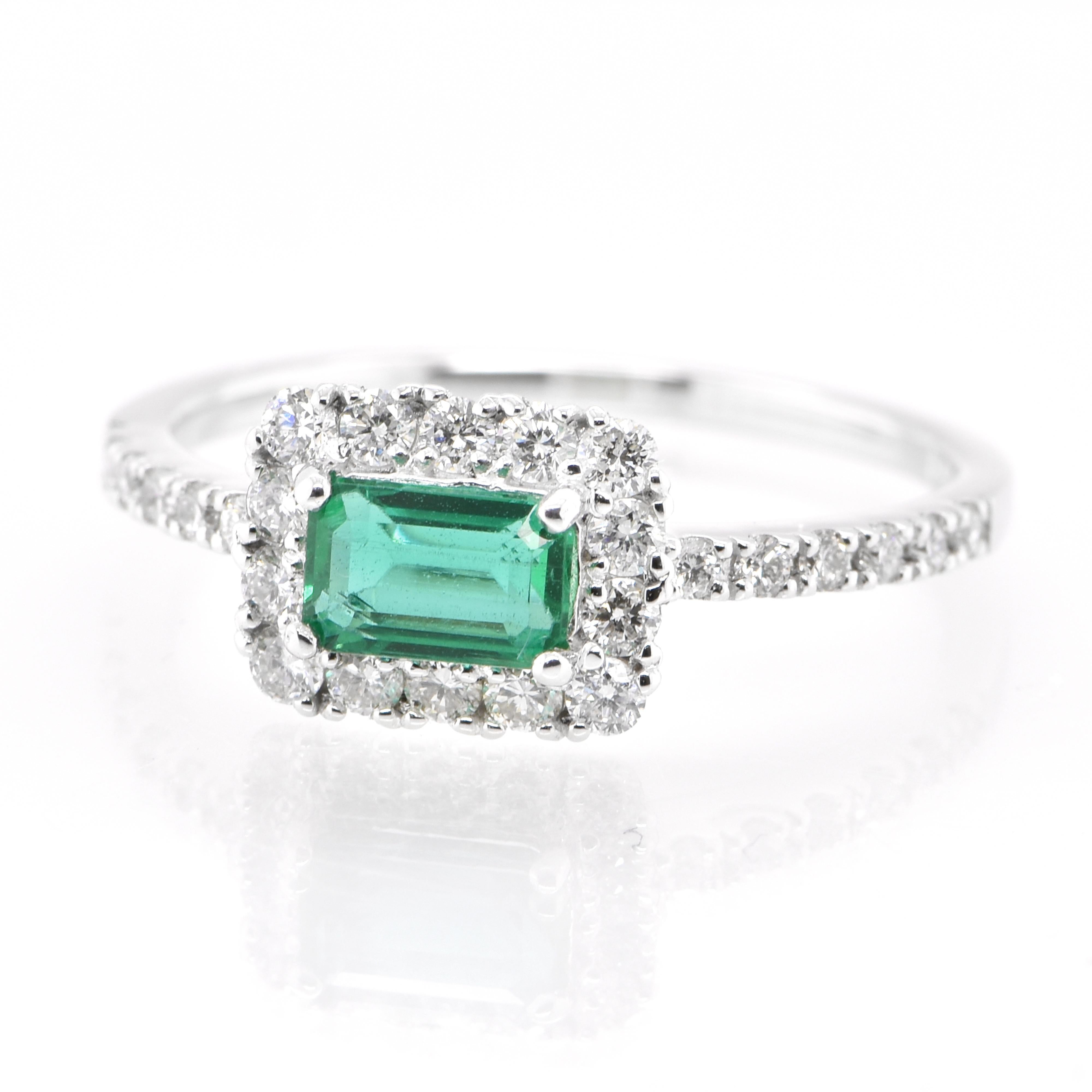 A stunning ring featuring a 0.52 Carat Natural Emerald and 0.37 Carats of Diamond Accents set in Platinum. People have admired emerald’s green for thousands of years. Emeralds have always been associated with the lushest landscapes and the richest