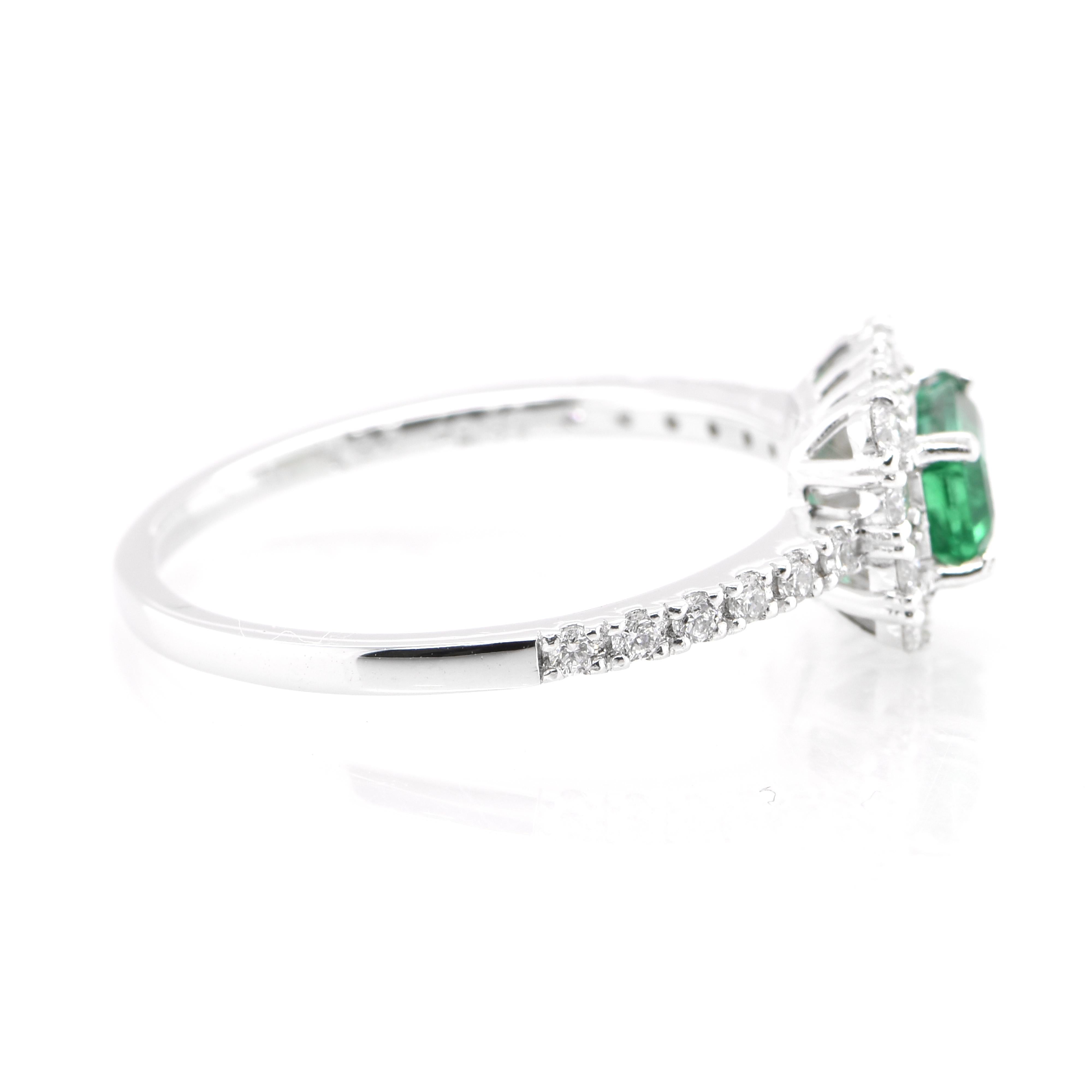0.52 Carat Natural Emerald and Diamond Engagement Ring Set in Platinum In New Condition In Tokyo, JP