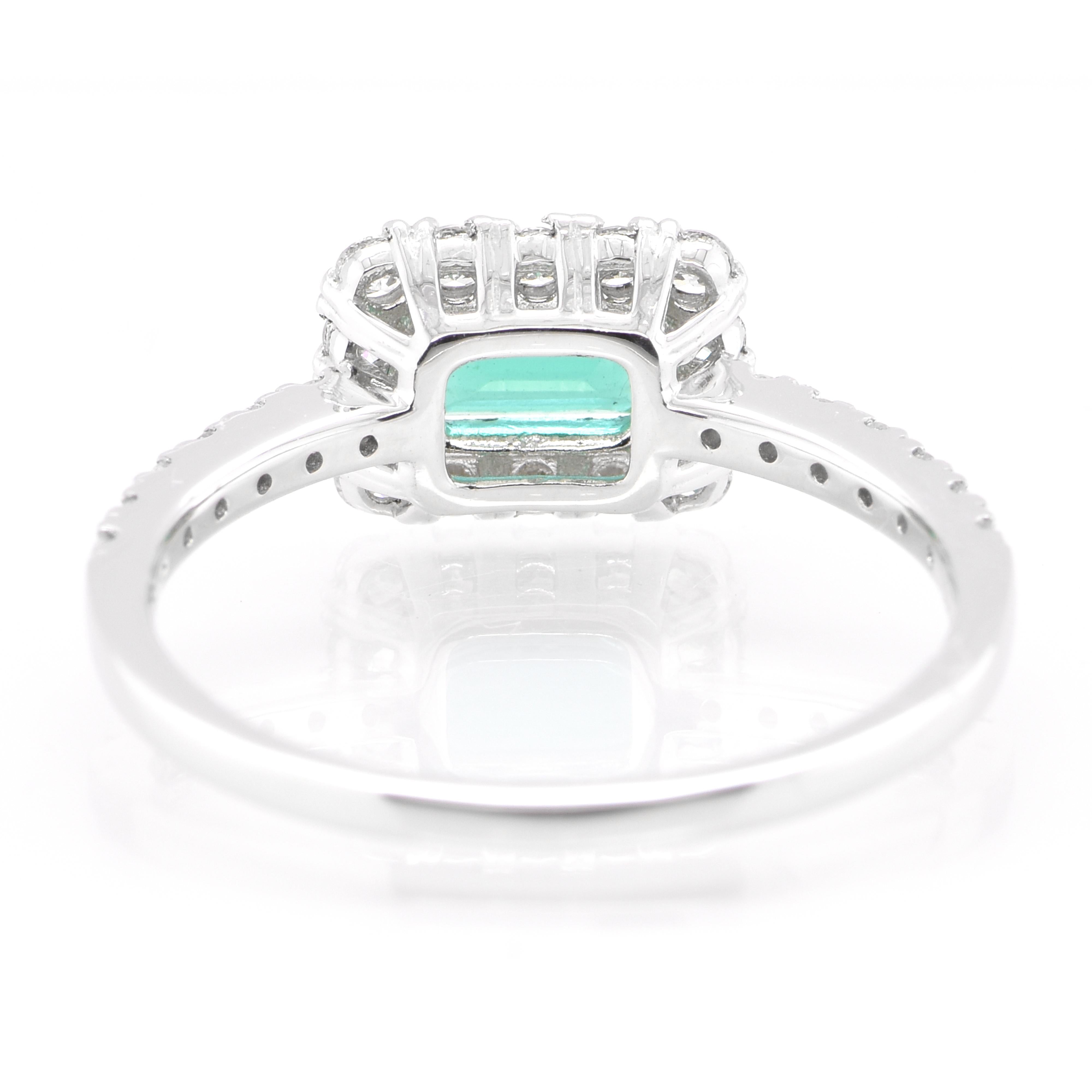 Women's 0.52 Carat Natural Emerald and Diamond Engagement Ring Set in Platinum