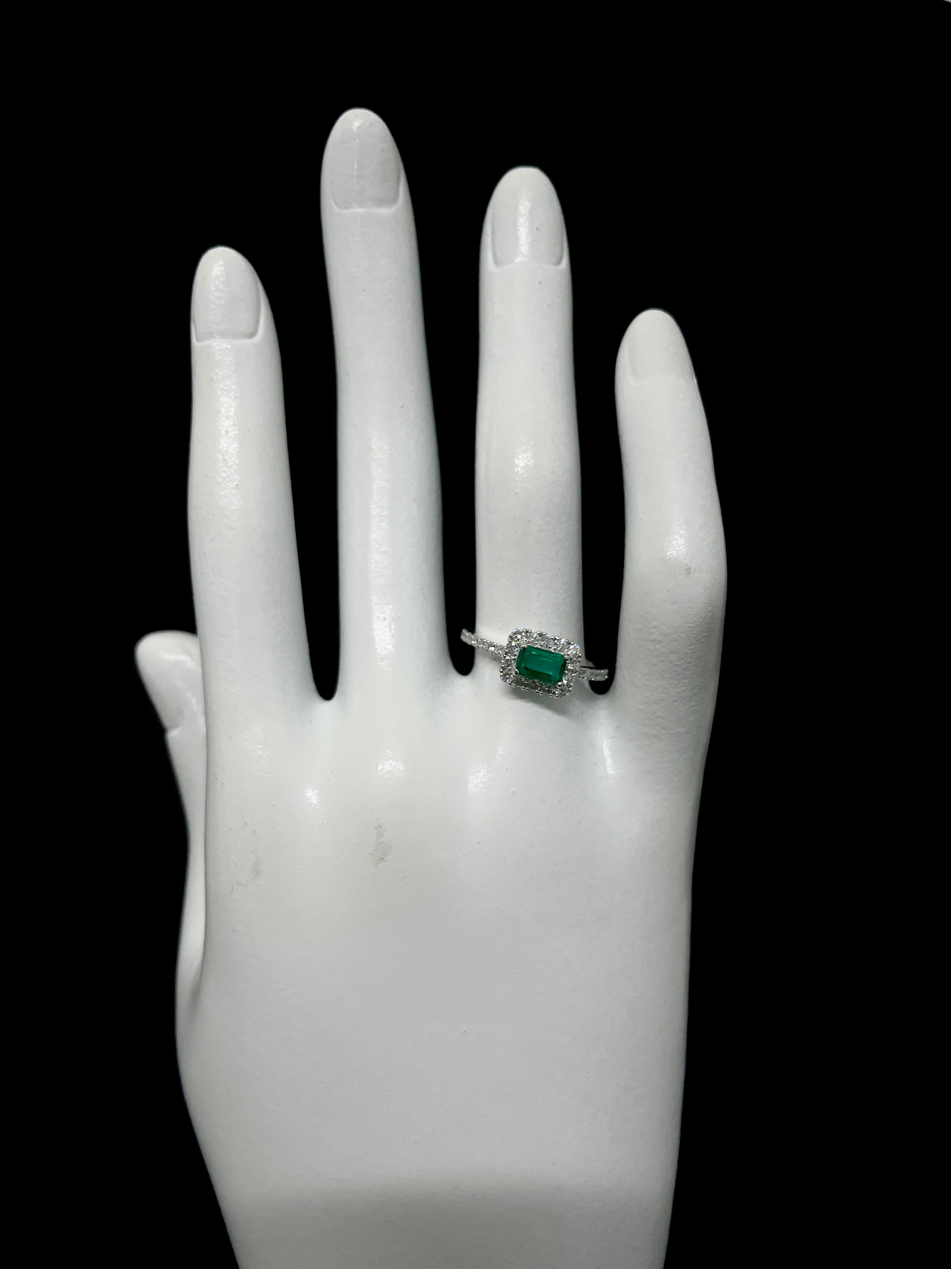 0.52 Carat Natural Emerald and Diamond Engagement Ring Set in Platinum 1