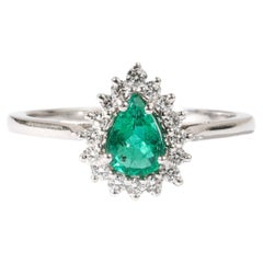 0.52ct Pear-Cut Emerald Halo Engagement Ring in 18K White Gold with Diamonds