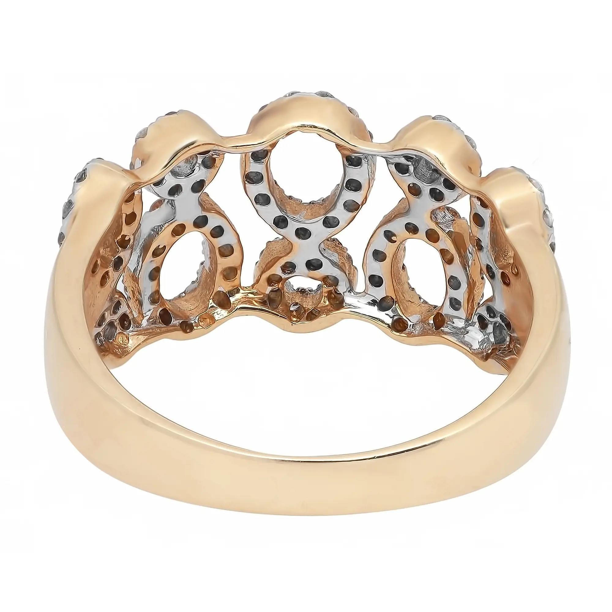 This wide circular openwork design band ring is crafted from rich 14K yellow gold. Set with round cut diamonds, totaling 0.52 carat. The diamond color is I with SI2-I clarity. Ring size 7.5. Width of the ring is 11 mm. Total weight: 4.96 grams.