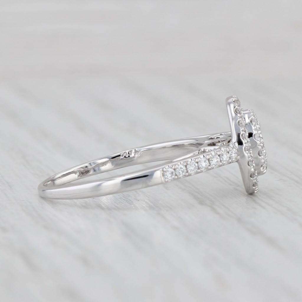 Gemstone Information:
- Natural Diamonds -
Total Carats - 0.52ctw
Cut - Round Brilliant
Color - E - H
Clarity - VS2  SI1

Metal: 14k White Gold
Weight: 2.8 Grams 
Stamps: 14k
Face Height: 10.6 mm 
Rise Above Finger: 6.4 mm
Band / Shank Width: 1.5