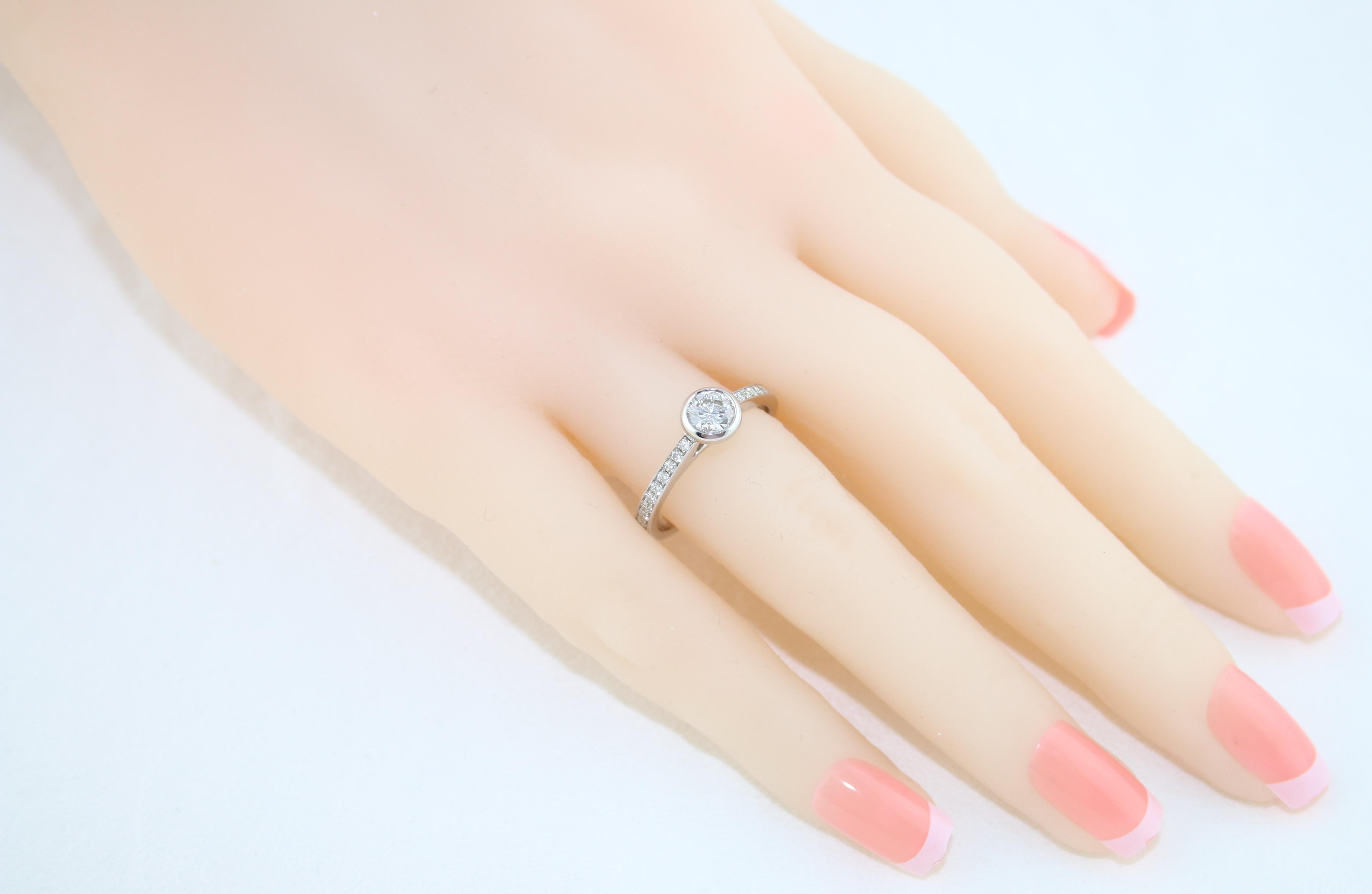 0.53 Carat Diamond Bezel Gold Engagement Ring For Sale 1