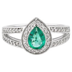 0.53 Carat Emerald and White Diamond Ring in 14 Karat White Gold