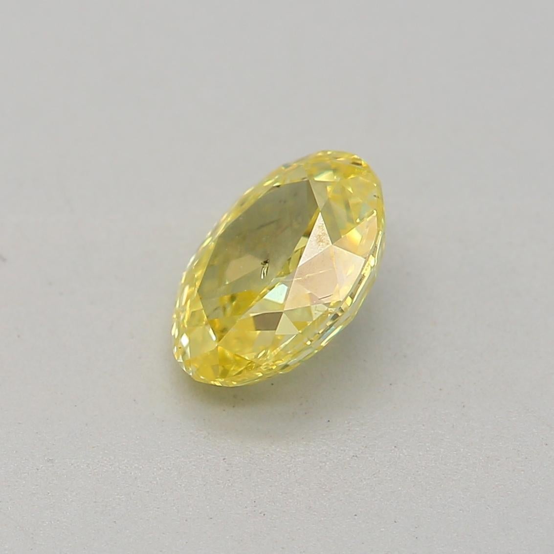 Oval Cut 0.53 Carat Fancy Intense Yellow Oval cut diamond SI2 Clarity GIA Certified For Sale