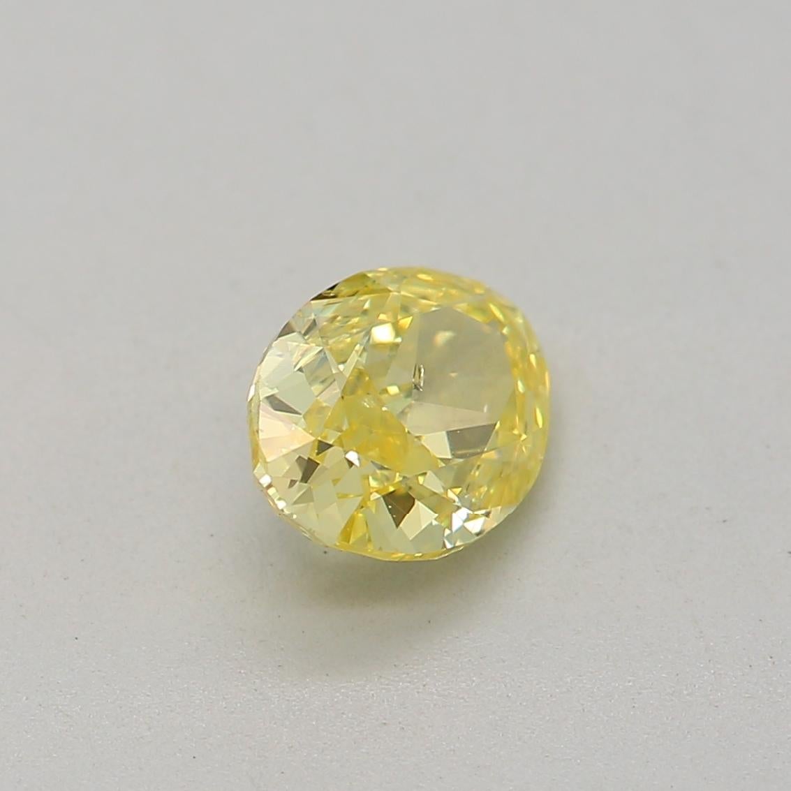 Women's or Men's 0.53 Carat Fancy Intense Yellow Oval cut diamond SI2 Clarity GIA Certified For Sale