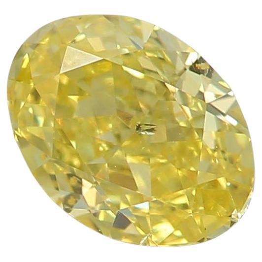 0.53 Carat Fancy Intense Yellow Oval cut diamond SI2 Clarity GIA Certified For Sale