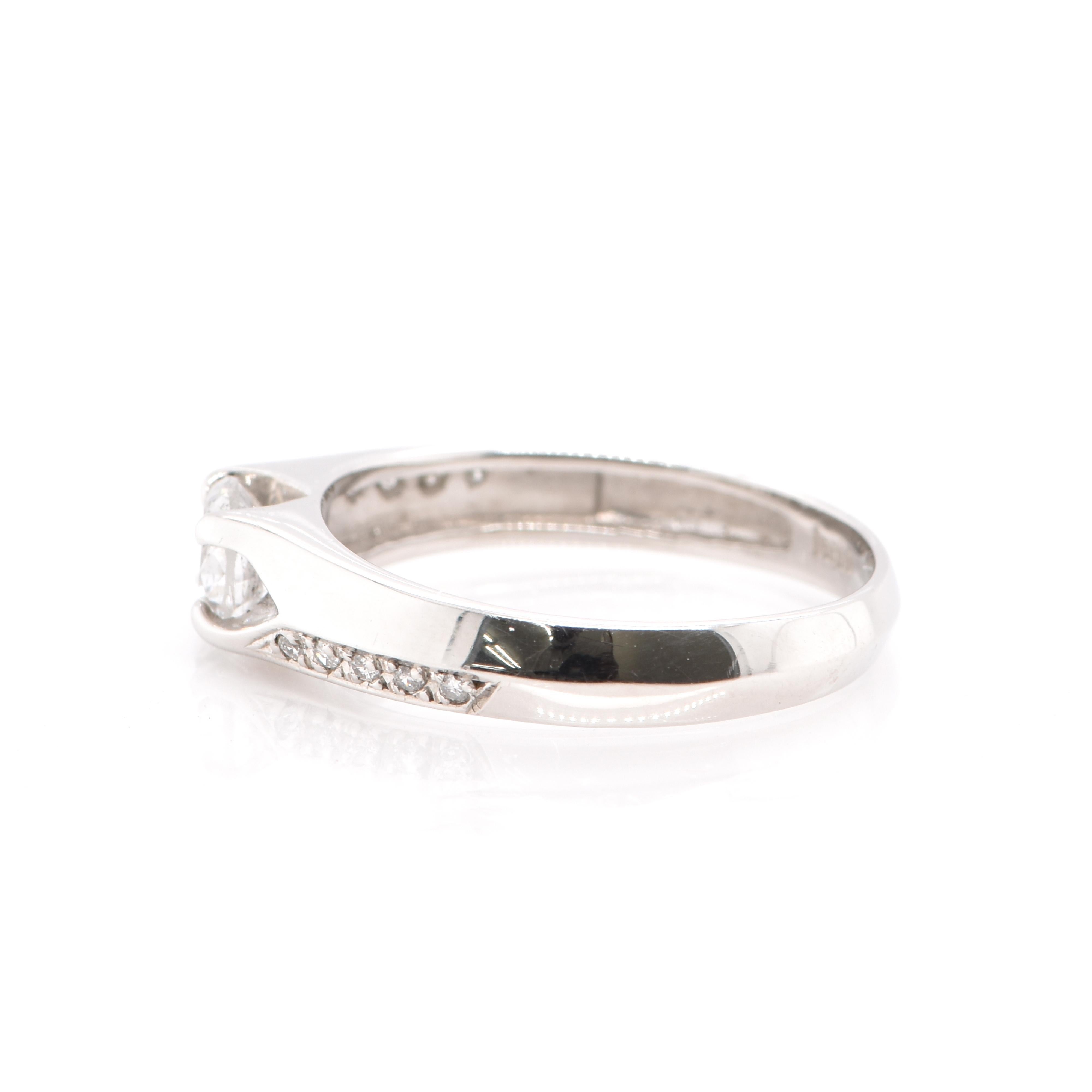 Round Cut 0.53 Carat Natural Diamond Ring Set in Platinum For Sale