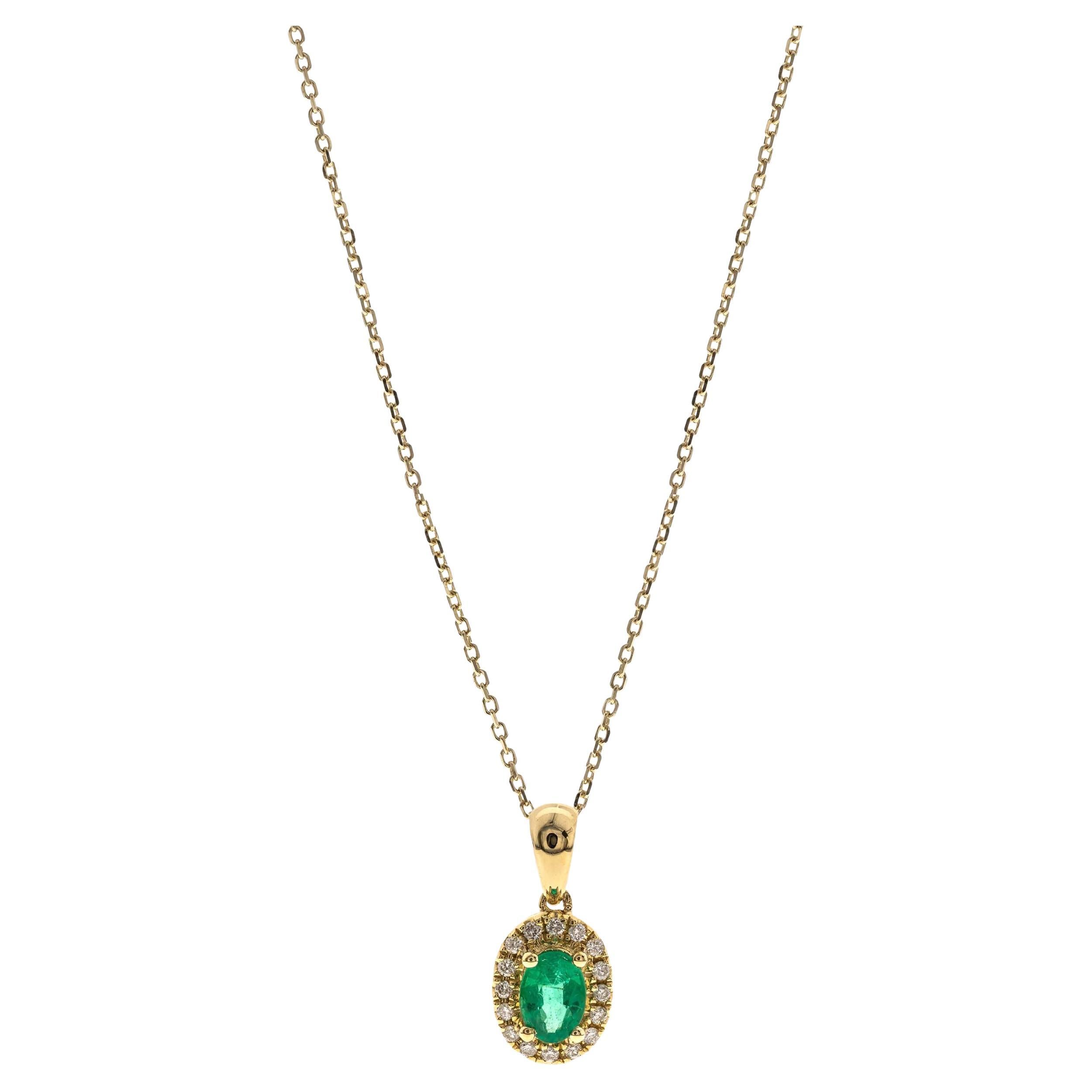 0.53 Carat Oval Cut Emerald Diamond Accents 10K Yellow Gold Pendant For Sale