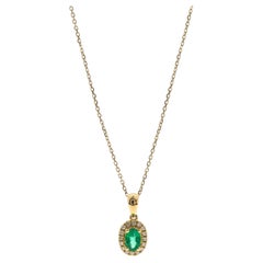 Vintage 0.53 Carat Oval Cut Emerald Diamond Accents 10K Yellow Gold Pendant