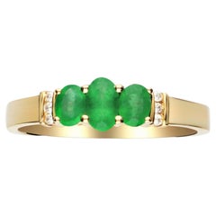 Vintage 0.53 Carat Oval Cut Emerald Diamond accents 14K Yellow Gold Wedding Ring.