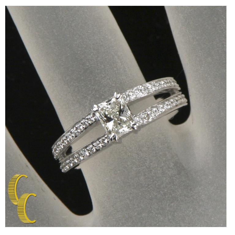 Women's 0.53 Carat Radiant Diamond Solitaire Ring with Accent Stones in White Gold