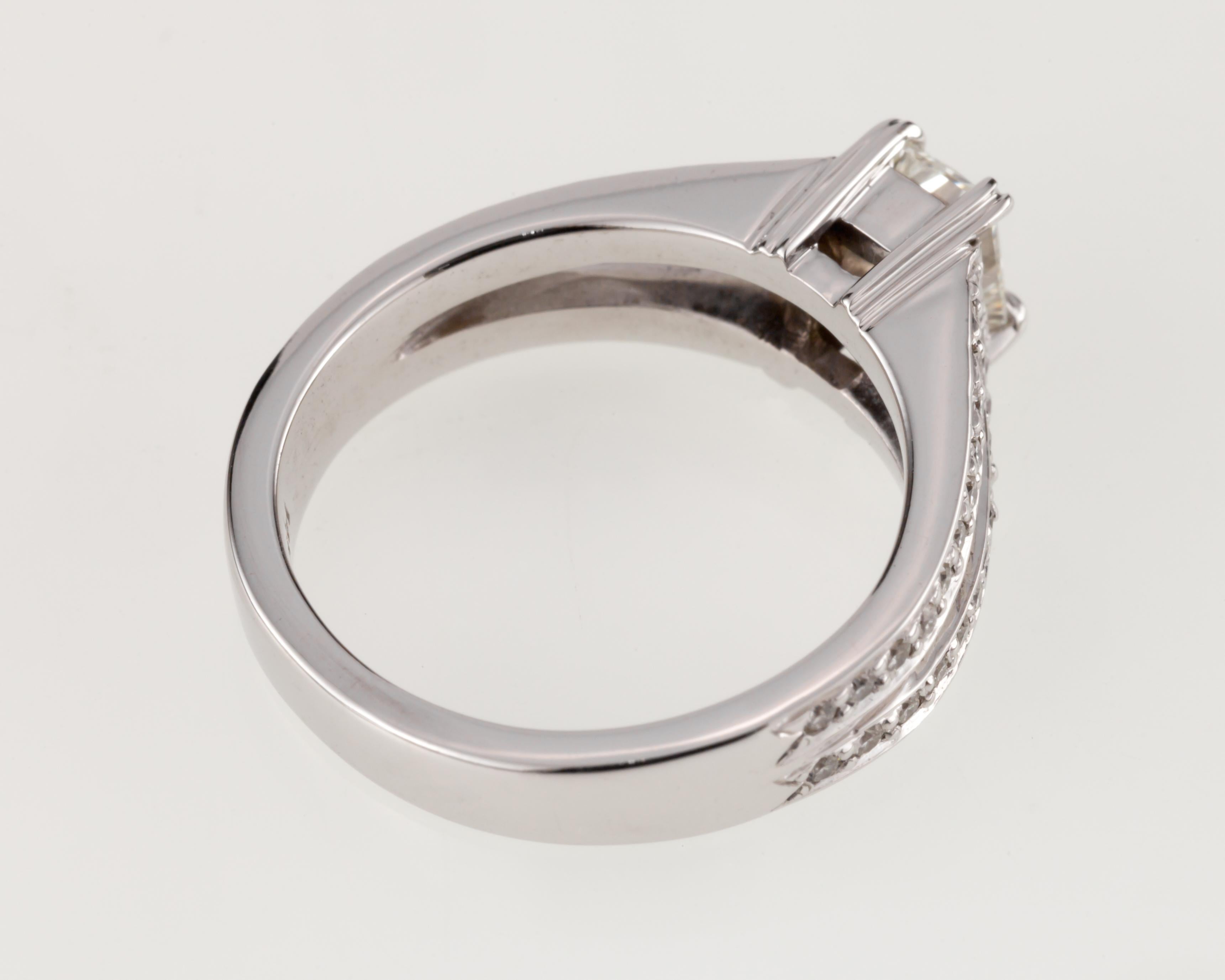 0.53 Carat Radiant Diamond Solitaire Ring with Accent Stones in White Gold 9